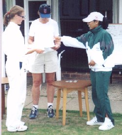 The Berkshire Captain Collects The First Prize Award in the Marlow 6 aside from England player Isa Guha