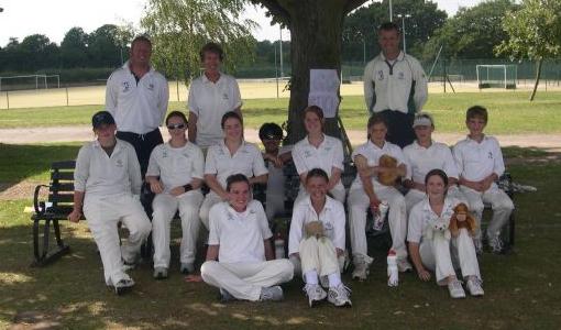 The U15 team with coaches and manager at Hook