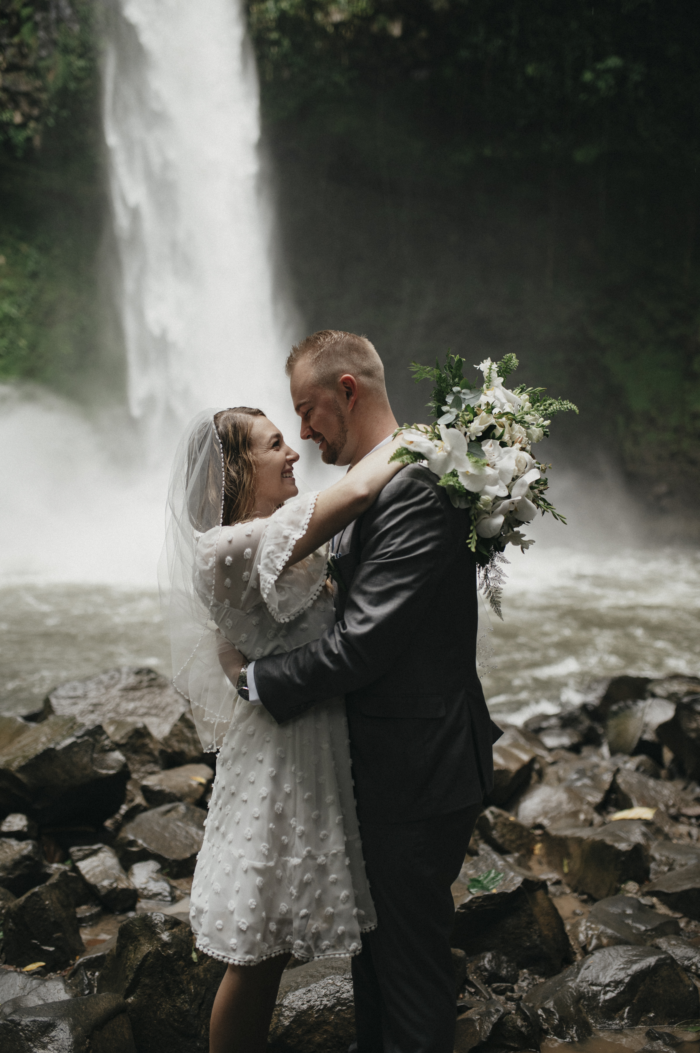 Kissing by a Waterfall