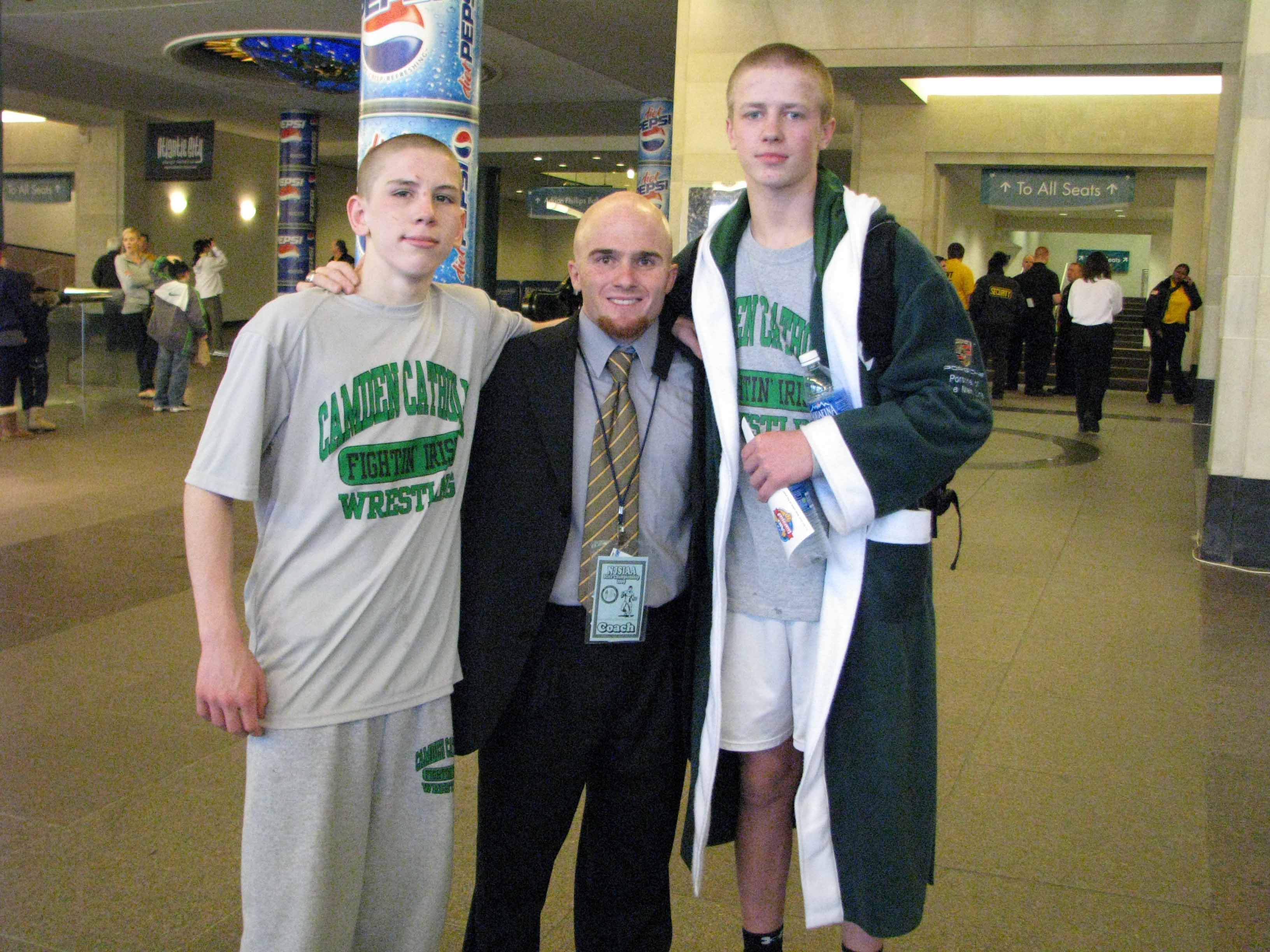 Coach Boland with Matt & Taylor!