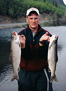 Two Lakers over 20inches and more than 4 pounds a piece Long Lake AK