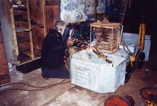 Installing the control box on a small loco at South Crofty.