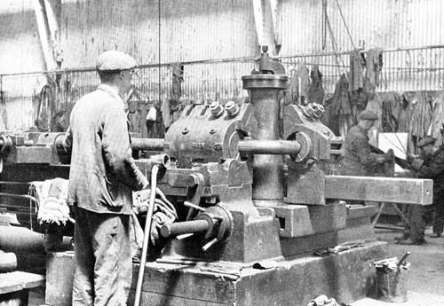Bending a piece of pipe.  Falmouth Docks circa 1946