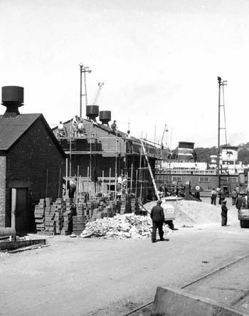 New Compressor House with tankers in background.  Circa 1957.