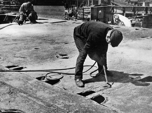 Burning parts of main deck. Falmouth Docks circa 1946.