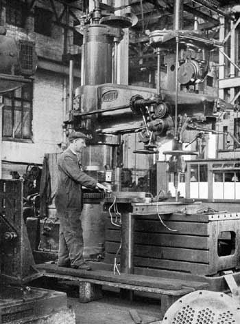 Fitter machinest drilling on a radial drill.  Falmouth Docks circa 1946.