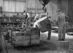 Moulding Shop.  Pouring Molten Metal.