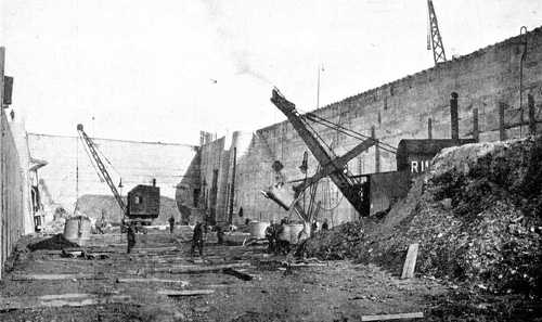 Steam Navvies working in the bottom of the new No 4 dock.  Falmouth Docks.