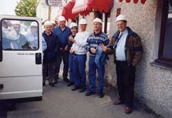 Tourists after a tour of Falmouth Docks. 2002.