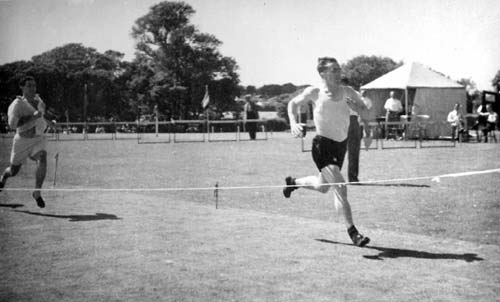Alan Ahrens winning a race on Falmouth Dock's Sports Day circa 1950