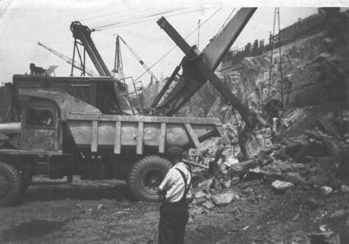 Euclid Lorry awaiting a load of rock.  Falmouth Docks circa 1956.