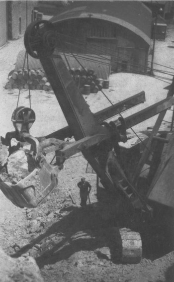 Man beside 54 R3 bucket.  Falmouth Docks circa 1954.