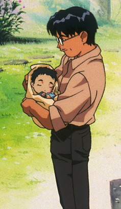 Nobuyuki holding his baby boy, Tenchi