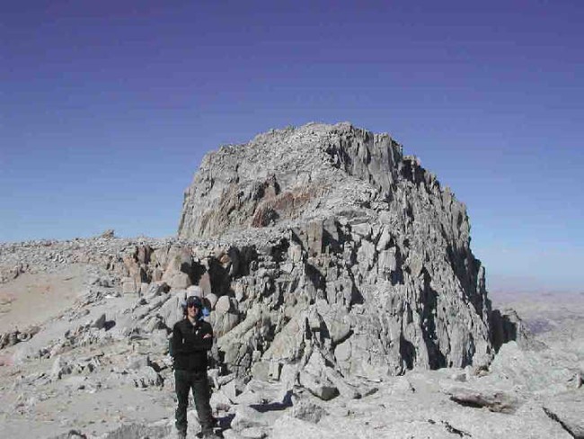 Miguel standing before final summit ridge of Conness
