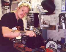Ove working in the garage. Click to enlarge.