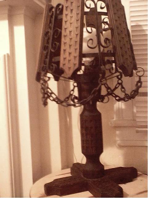 I got this kewl lamp for $6 at at yard sale... it's so medieval looking!!!