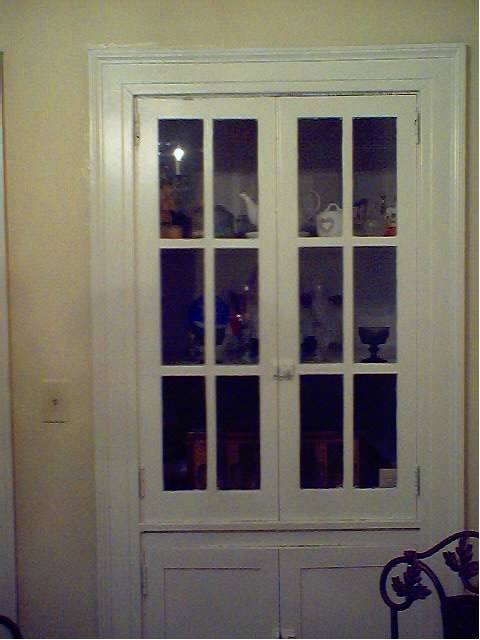 My china cabinet... holds candles, stemware, glassware, souvenir glasses, etc