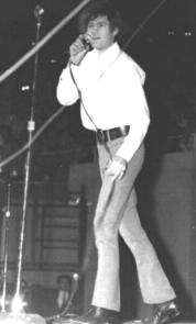 MICKY SINGING DURING A CONCERT