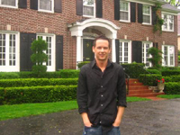 Justin in front of "Home Alone" house