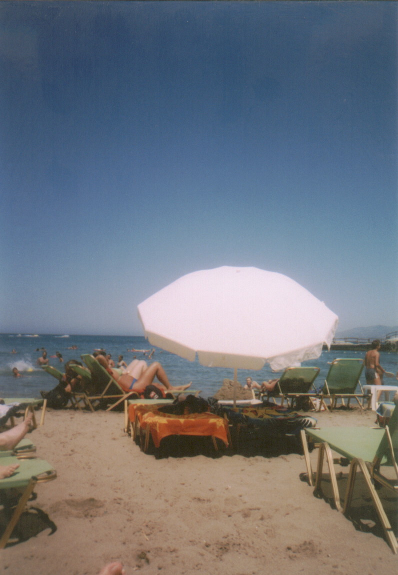 Lying on the beach relaxing - Jade's in the sea somewhere