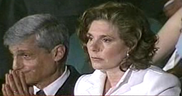 Ms. Heinz looks intently