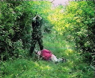 rebel aiming knife over his head