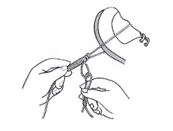 Tying Bimini Twist Knot Step by Step Pic 8 - Withdraw your loop, drawing the tag back out from under the last few wraps.