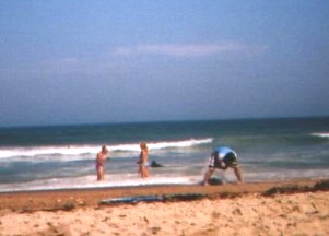 I don't know why that guy is digging a hole in the sand...