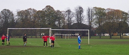 Going up for a corner against The Essentials