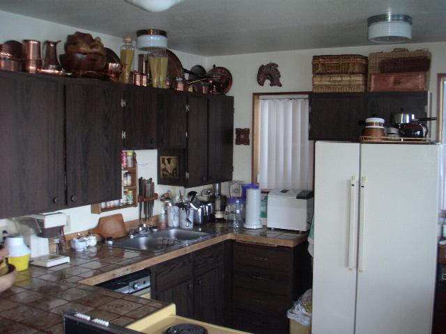Microwave, trash compactor, bread maker and numerous small appliances.