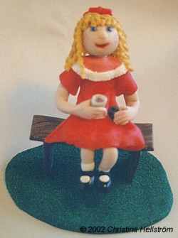 Girl with milk and a cookie