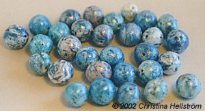 Beads made with metallic paint
