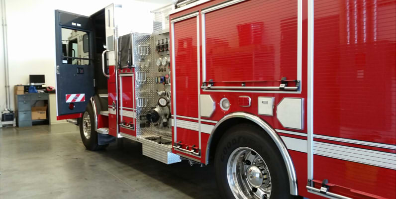 Watching the technicians fix firetruck engines