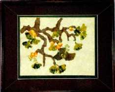 paint, paper and leaf collage of ginko branch