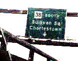Exit sign on I-93 for 38 South, Sullivan Sq, and Charlestown