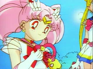 Chibi Usa looks at her crystal carillon