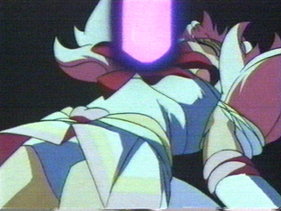 The mirror is being removed from Chibi Moon's body