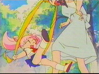 Cutiest panty shot! Chibi usa swings on Usagi's hair kicking up her legs exposing her panties ^-^