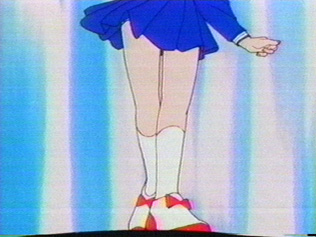Rini has nice legs, the edge of her underwear shows