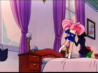 Chibi Usa tip toes on the bed showing a bit of her panties