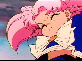 You can see a bit of the top of Rini's chest