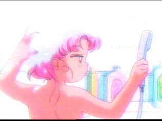 A back view of the top part of her little breast ^-^