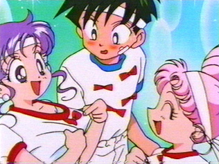 Momoko pulls out her shirt showing the top of her chest ^-^