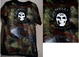 White Logo on Black Shirt with "cosmic" print background of front