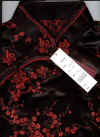 sleevelessblackcheongsam21.jpg (46233 bytes)