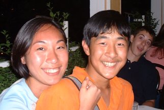 J & Ed - close sis & bro.. and some weird random kid in the back.. =p
