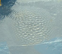 Golf ball shaped puddle