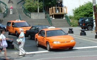ORANGE taxi cabs!