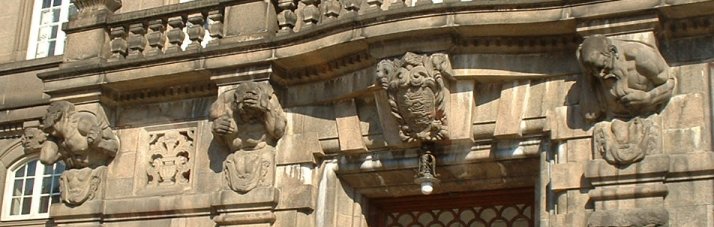 men carved out of stone.. looks like their in agony? Maybe cuz its the Parliament..