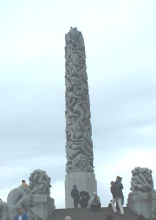 The Monolith (carved out of 1 piece of stone) shows struggle of Existence/Success/Life? - a pillar of people reaching for the top